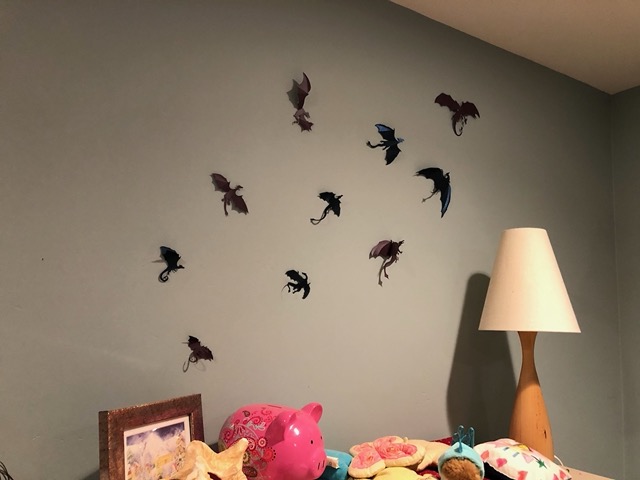 Lela got her paper dragons up