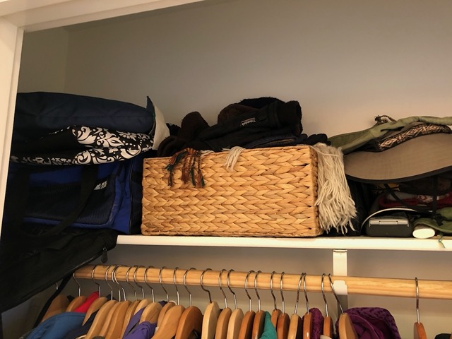 Looming piles of stuff in closet