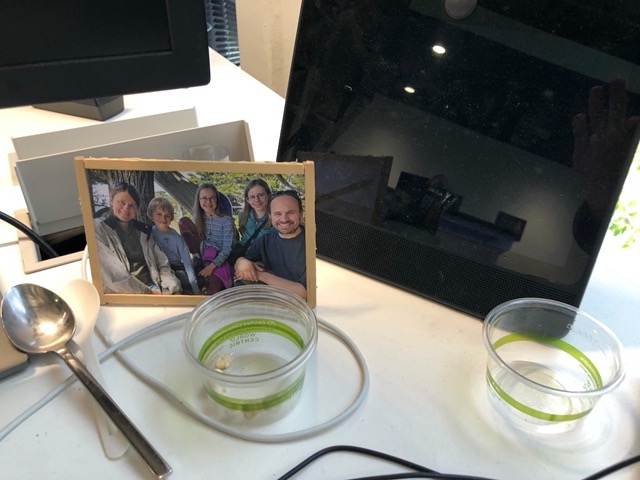 Personal effects and some wasabi peas he'd left on his desk