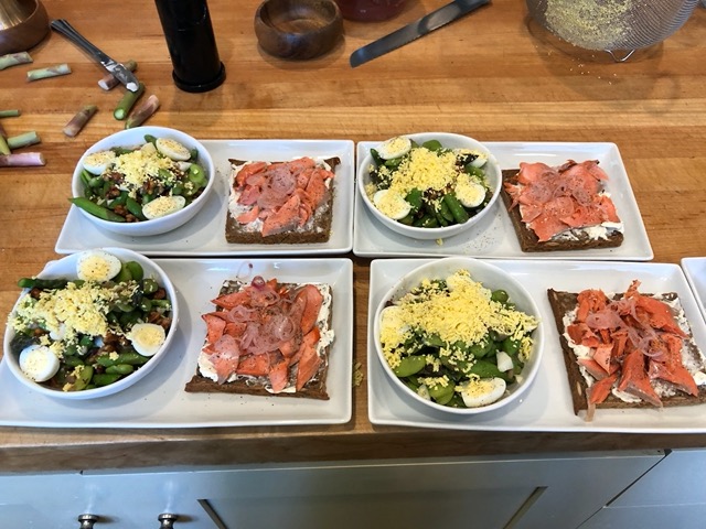 Lunch of asparagus salad with chicken and quail eggs, and grilled salmon on rye