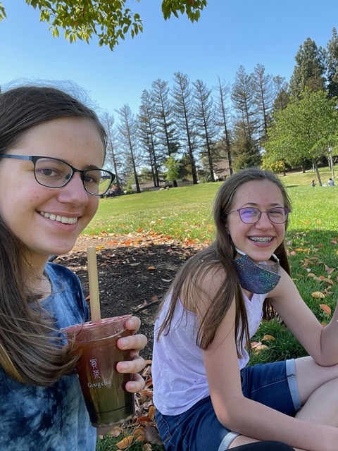 Enjoying boba tea in the park