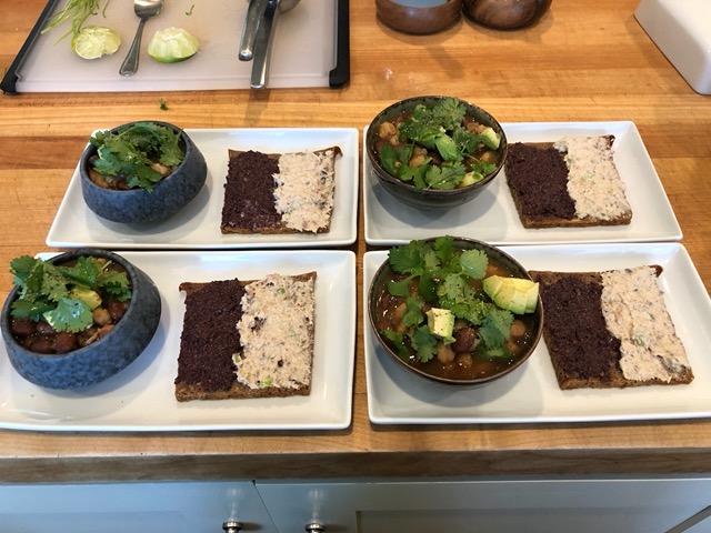Dinner of chili with toppings, and rye with tapenade and sardine rillettes