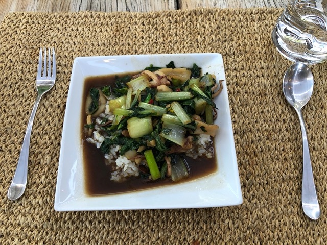 Thai stir fry with squid on rice