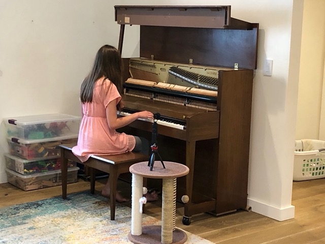 Ellie recording a piano piece