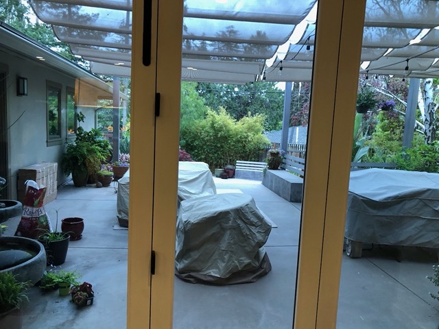 We got covers for our patio furniture.  Planter is in boxes at left