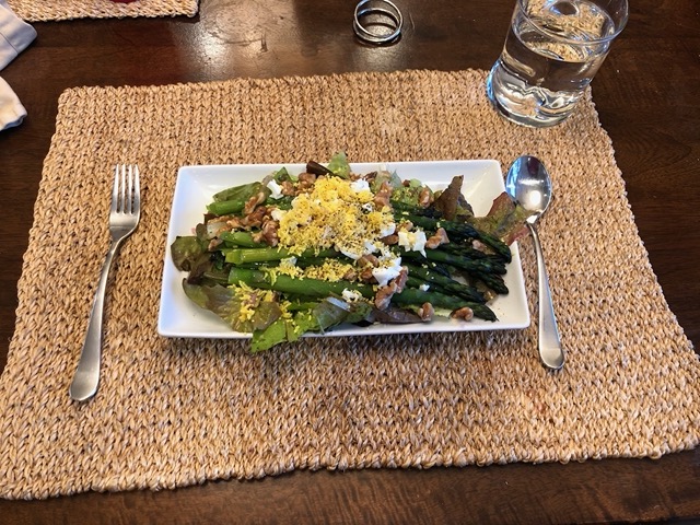 Asparagus salad with toasted walnuts and boiled egg