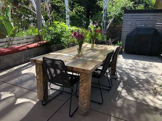 Getting patio table up for Lela's friends