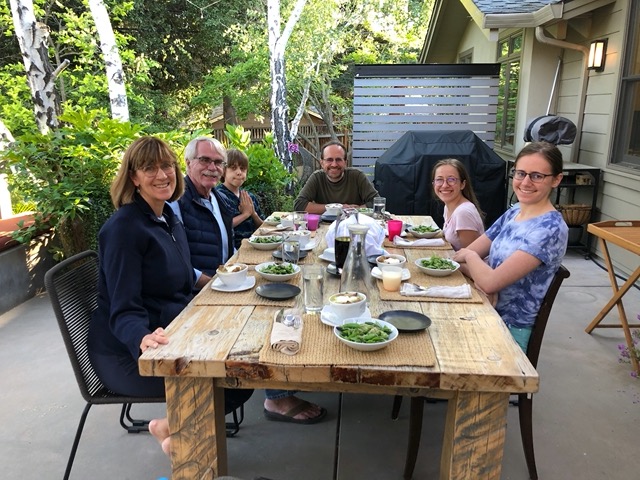 Dinner on the patio:  spring salad and white bean soup with chard and poached egg