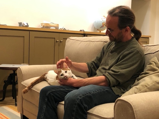 Mike with Gizmo on the couch