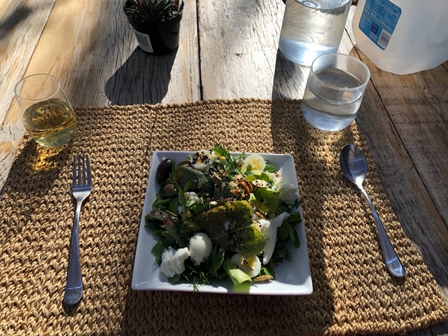 Herb salad with seeds and quail eggs