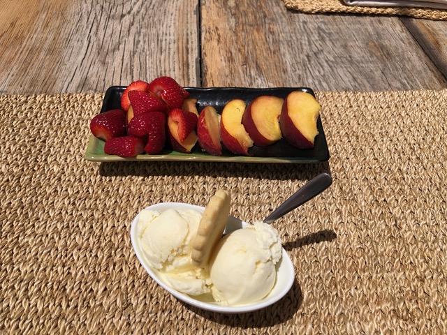 Dessert the next day: summer fruit, lemon ice cream, and a lemon cookie