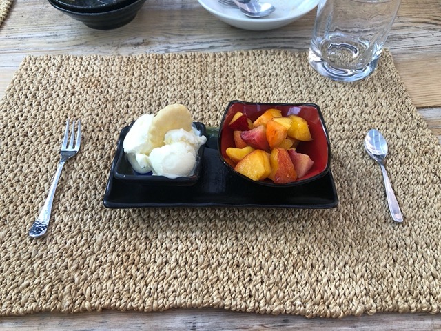 Lemon ice cream, lemon cookie, and stonefruit