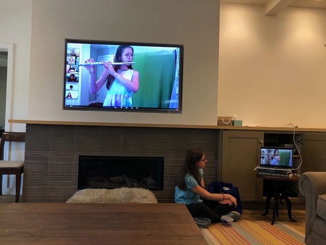 Ellie's flute recital!  She's playing live from her room