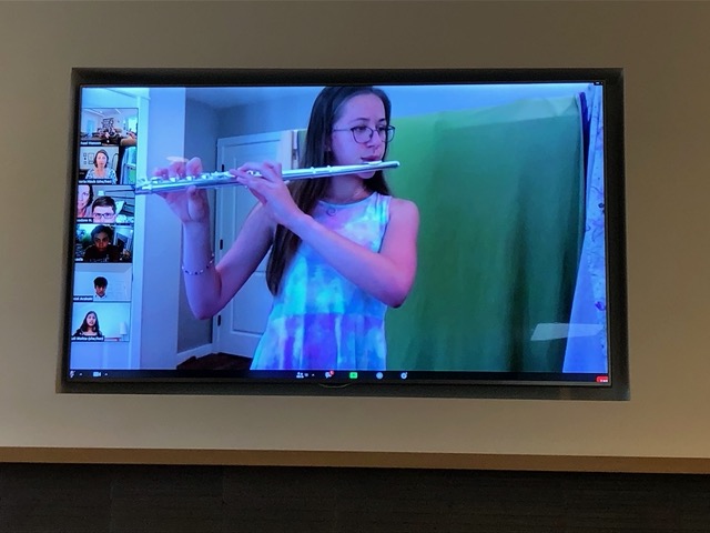 Closeup on Ellie doing her flute recital
