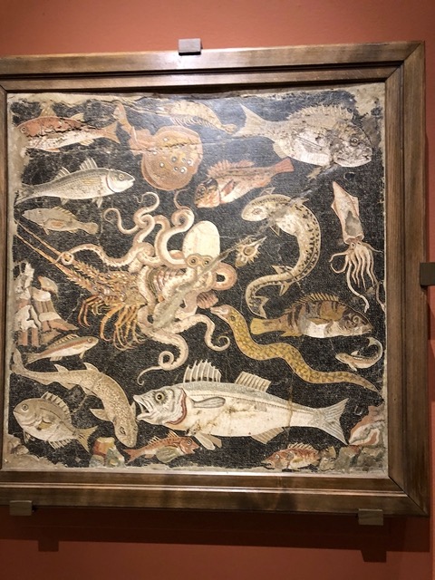 Incredible mosaic of local sea life, including an octopus entwined with a lobster