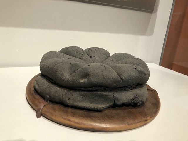It is a distinctive loaf, with eight sections and a rope around the middle