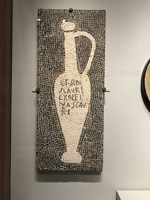 Mosaic of a garum bottle.  Garum, a fish sauce similar to those in SE Asia, was Rome's ubitiquitous seasoning
