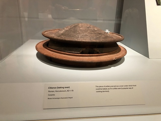 Cover under which food could be baked, as in a little oven