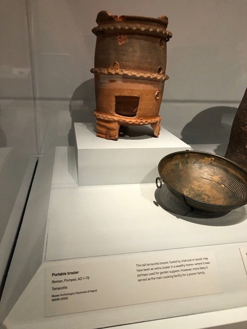 Tall terracotta brazier, fueled with charcloal or wood through that hole
