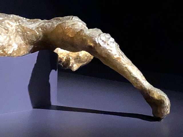 You can see the folds of her clothing, and the bones inside the resin