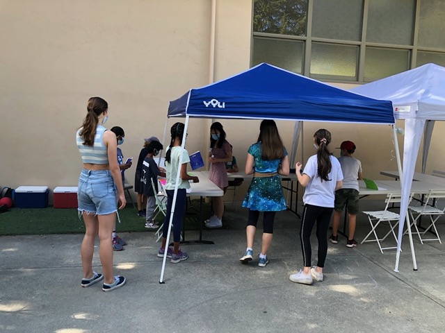 Owen's French and art camp starts!  Lela is a counselor at the camp as well
