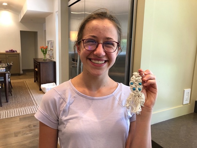 Ellie with a little macrame craft