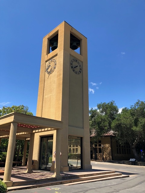The clock tower, with the hands stopped.  Nobody here to wind them