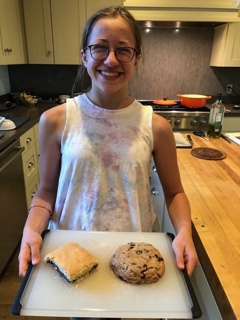 Ellie with dessert: fig bar and giant chocolate chip cookie