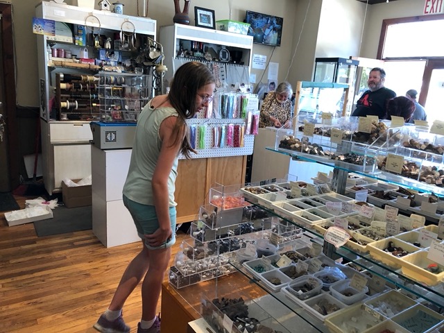 Ellie in the rock shop (she got a lovely teardrop necklace)