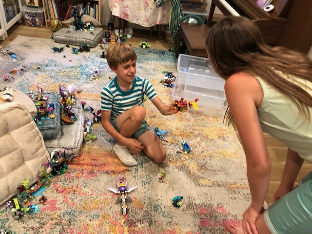 He's playing with the dragon sets