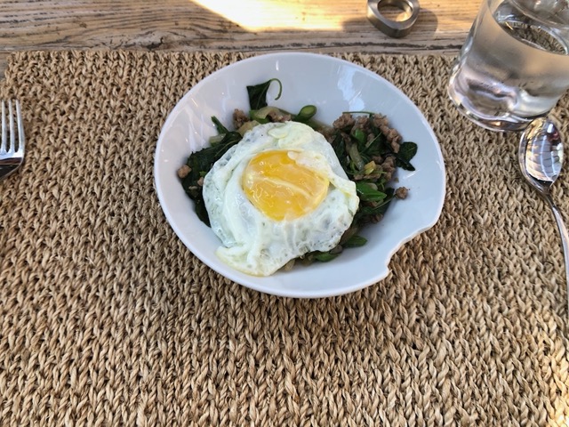 Thai pork and green bean stir fry with fried egg