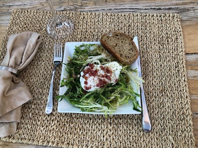 Frisee salad with lardons and sourdough.  We had this almost weekly over the summer
