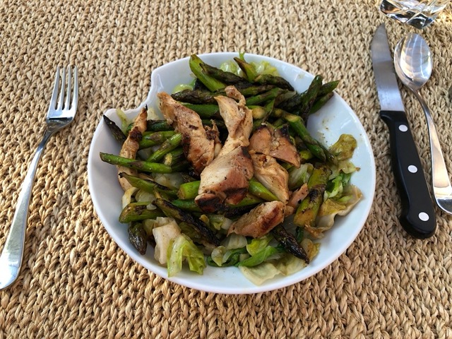 Grilled asparagus and chicken on salad