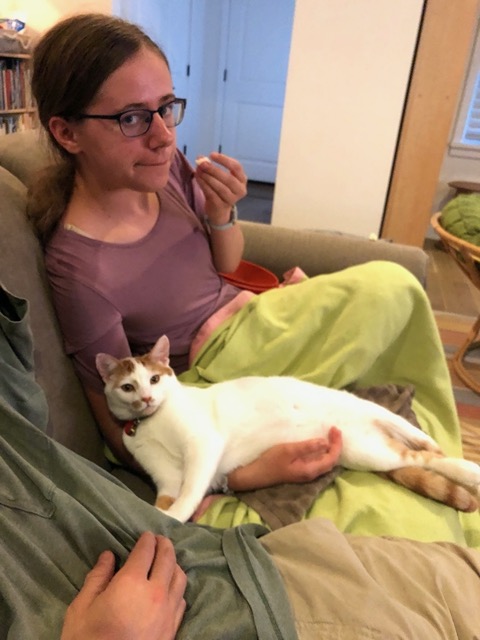 Watching a movie, with popcorn and Gizmo