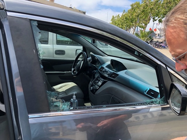 We got back to our car to find the front passenger window smashed