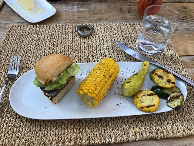 Summer dinner of slider, corn and grilled squash