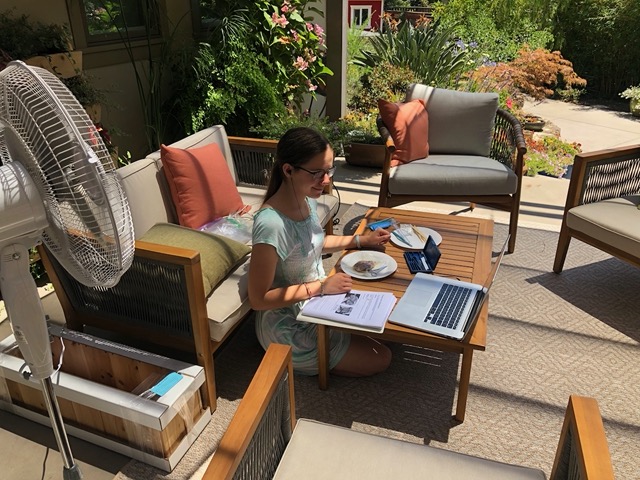 Lela doing her sheep brain dissection on the patio