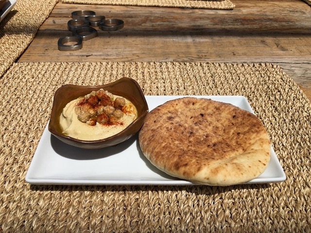 Hummus with chickpeas and paprika, and flatbread from Oren's for