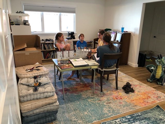 Mike leading a D&D game with all three kids