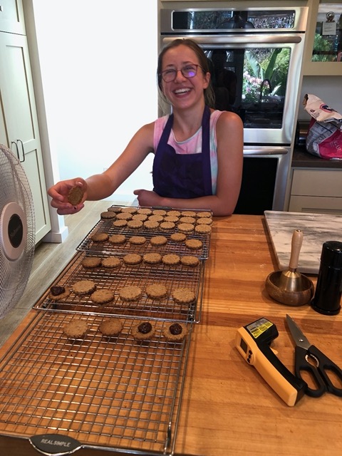 Making hazelnut sandwich cookies with chocolate centers