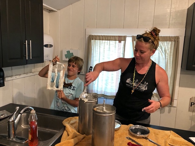 Jessica is making ice cream for summer camp! She let Owen lick the beater