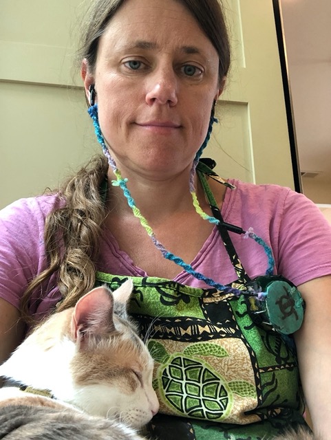 She comes up to me an meows with a direct stare.  I sit, she jumps in my lap