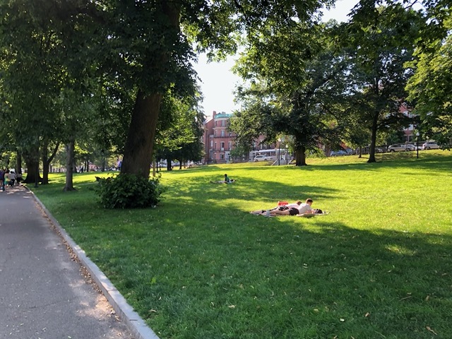 It's a beautiful day.  Lots of people out enjoying it on the grass