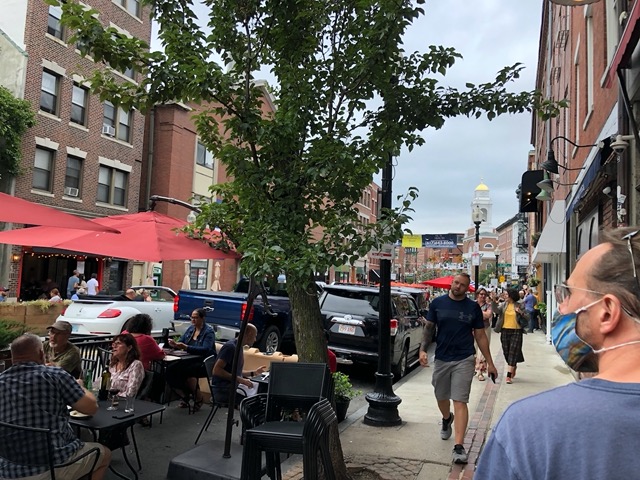 Walking through Little Italy, with lots of dining outdoors