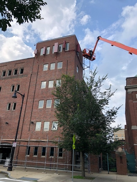 Walking to the art museum.  Camouflaged construction up there