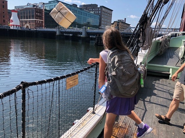 Ellie throwing the tea overboard! (it's top left!)