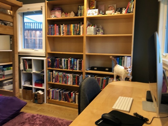Their exploration goes higher, onto Ellie's desk