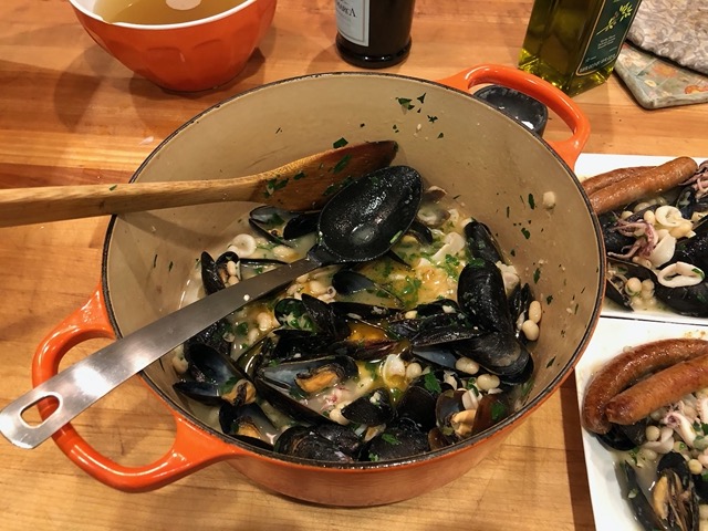 Dinner of white beans, mussels, and squid