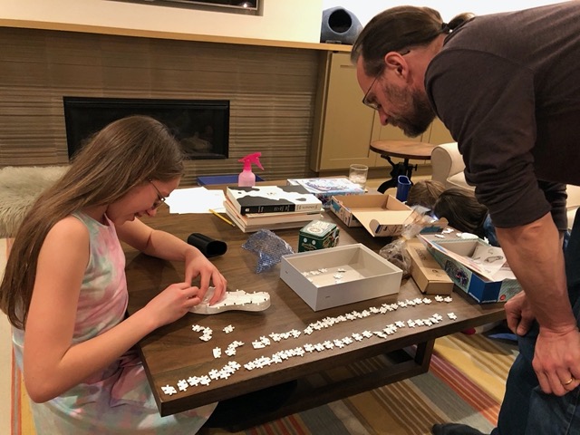 Ellie putting her 3D shoe together