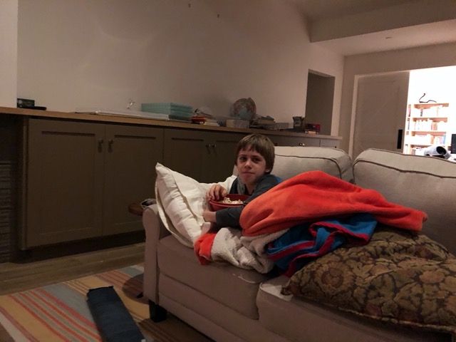 Owen can eat popcorn again!  It's not allowed with braces.